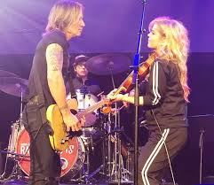 Y'all… A couple weeks ago I got a text that I never could have seen coming.  I got the invite to play and sing in the band alongside one of my Mt