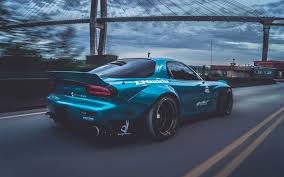 We have a massive amount of desktop and mobile backgrounds. Download Wallpapers Rocket Bunny Tuning Mazda Rx 7 Movement Blue Rx 7 Supercars Mazda Besthqwallpapers Com Blue Car Mazda Rx7 Sport Cars