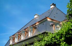 Aged copper standing seam roof with characteristic green patina. Copper Roofing In Indianapolis Jackson Contracting Inc