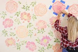 How to make giant paper flowers wall decor. How To Paint A Floral Watercolor Wallpaper Hack Using Reusable Stencils Diy Flower Wall Stencil Flower Stencil Floral Stencil