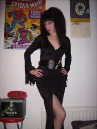 Dress, belt and dagger shoes and stockings are not included. Elvira Costumes Partiescostume Com