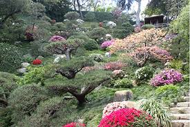 The japanese garden was designed by ken nakajima in 1992, includes a teahouse, waterfalls, bridges, and stone paths that wander among crepe myrtles, azaleas, japanese maples, dogwoods and cherry trees. Hannah Carter Japanese Garden The Garden Conservancy