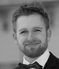 Investigation of the cutting plane and tolerance analysis of cross-coupled  W-band waveguide filters with multiple transmission zeros by source to load  cross-coupling