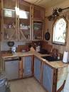 J.J.” CabooseTiny House Swoon | Tiny house kitchen, Rustic ...
