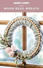 Diy Wood Bead Wreath In 2021 Easy Diy Wreaths Diy Yarn Wreath Paper Flower Wreaths