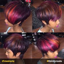 This sweet black and red hair combination is a great choice for ladies who aren't afraid to show off a vivid hue. Fierce Red Ombre Hair Color On Black Hair