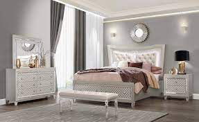 What furniture is included with each bedroom set? Paris Champagne Bedroom Set By Global Furniture