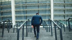 Person walking up stairs from behind. Back View Stylish Business Man Going Upstairs In Suit At Street Successful Businessman Walking At Stairs Alone Outdoors Stock Video Footage Storyblocks
