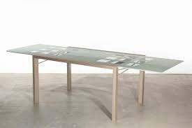 Glass dining tables are known for their versatility. Lot A Ligne Roset Parcel Frosted Glass Metal Mounted And Painted Wood Extension Dining Table Contemporary