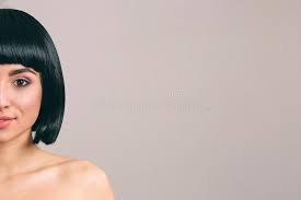 You can slowly decrease your hair length by going for the safer lob, for example, and gradually getting shorter and shorter when you feel like it. Young Woman With Black Hair Posing On Camera Cut View Of Brunette With Bob Haircut Loook Straight And Smile Dark Hair Stock Photo Image Of Modern Model 146634920