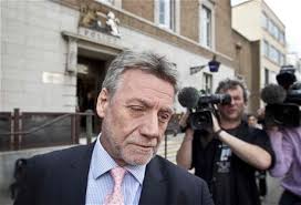 Phone hacking: News International paid Neil Wallis while he was at Scotland  Yard