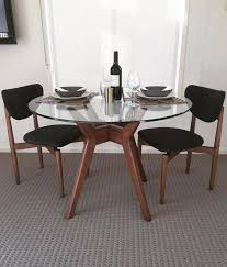 Mid Century Modern Inspired Table Setting For One Of Todd Devine Home S Display Home Sarah Miranda West Elm In 2020 Dining Table Glass Round Dining Table Glass Dining Table