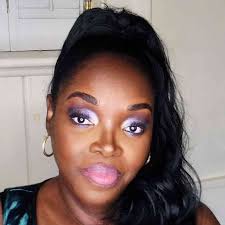 Can you keep a US credit union account while living in Belize and transfer  funds electronically, or is it best to set up an international bank account?