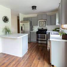 The details in the lighting and kitchen rug are more visible with a black and white background. Before And After Small Kitchen Remodels