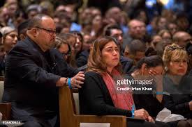 From left, Gregory Casillas, the father of slain police officer... News  Photo