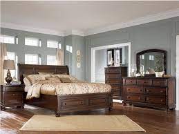 Nicole seidlitz, founder of nicole seidlitz feng shui and instructor at the international feng shui school, has some tips to share to help you arrange and optimize your bedroom according to these principles. Dark Brown Wood Bedroom Furniture With Dark Smokey Blue Walls White Bedding Brown Wood Bedroom Furniture Bedroom Furniture Sets Bedroom Collections Furniture
