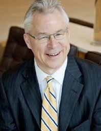 Scott Griggs ousted Dave Neumann from the City Council, but it's Neumann  who will stand with Mayor Mike Rawlings Wednesday