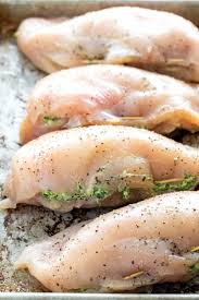 Hold your knife horizontal to the chicken, and use it to stab the chicken breast, starting on the thicker side, so that the knife is half way between the top and the bottom Spinach Stuffed Chicken Breast Jessica Gavin