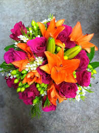 Stunning simple bouquet with ranunculus in pink, orange , red and white! Bride S Bouquet Pink Wedding Flowers Orange And Pink Wedding Prom Flowers