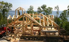 Timber frame homes feature large structural wooden beams visible throughout the interior which act as the structural skeleton of the home. Timber Frame Home Design Plans