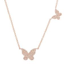 The price also rises when the dollar declines. 14k Rose Gold Double Butterfly Diamond Necklace Maurice S Jewelers