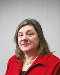 First National Bank of Suffield promotes four