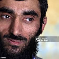 Convicted insurgent Mohammed Ullah, age 50, stands in the... News Photo