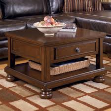 In stock $ 619 00 $ 458 00 $ 619 00 $ 458 00 compare. Signature Design By Ashley Porter Rectangular Lift Top Cocktail Table Royal Furniture Cocktail Coffee Tables