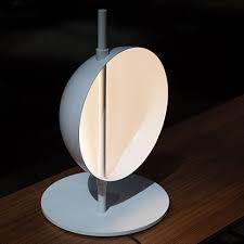 Making his debut with oluce, victor vaisilev proposes the superluna lamp project that was inspired by a personal reflection on vico magistretti's work, with his ability to develop iconic shapes to enhance the potential of the light source. Oluce Superluna Table Lamp Surrounding Com