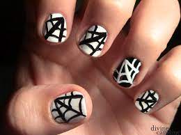 While everyone is still coming up with their costume, take halloween into your own hands … literally. Spider Web Nail Art Design More