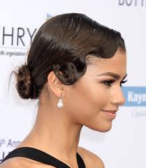 Using pomade, slick back the sides while allowing longer hair on top to flow freely in a poof. 12 Gorgeous 1930s Hairstyles That Will Always Be Popular