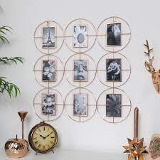 A wooden photo ledge is a sturdy solution for unique photo display, and still simple to secure to a wall. Copper Multi Frame Photo Display