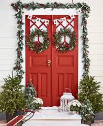 In addition to decorating the front door with a wreath, a sign or whatever else you prefer, there's also the option to put up a beautiful christmas tree on the porch. 12 Festive Christmas Decor Ideas For Your Door Macy S Guide