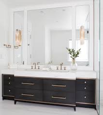 A double walnut vanity is topped with a clean white countertop in this chic bathroom. Delia Mamann Interior Design On Instagram Custom Bathroom Vanity Designed By Deliamamanninter Bathroom Vanity Designs Custom Bathroom Vanity Custom Bathroom