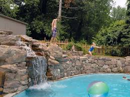 The jump arena is our main jumping and fun zone where friends can jump together and perform acrobatics while our rockin' jump staff monitor safe play from all welcome to rockin' jump! Pool Diving Jump Rocks Installation In Annapolis Baltimore Md Vistapro Landscape Design