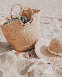Whats In Your Beach Bag Straw Beach Bag Bags Beach Tote Bags