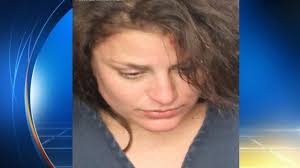 Florida woman urinates, defecates in police car after tossing dog into  traffic, cops say