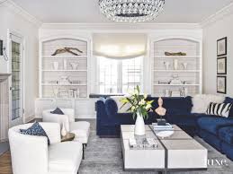 Color Pop Blue Velvet Sofa In White Living Room Blue Sofas Living Room Blue And White Living Room Living Room White