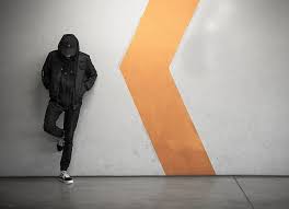 What does leaning against expression mean? Royalty Free Photo Man Leaning Against On White Wall Pickpik