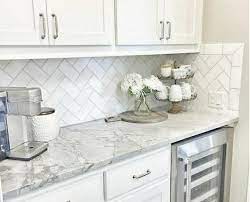 As is the same height as standard kitchen worktops. 17 Incredible Herringbone Tile Ideas Modern Kitchen Backsplash Kitchen Backsplash Designs White Subway Tile Kitchen
