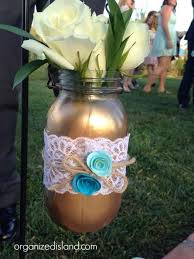 Mason jars can be easily hung from branches, chairs, and ceiling beams. Bridal Shower Mason Jars