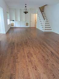 Layering dye, gel stain, and a topcoat is a way to turn red oak a consistent color with a beautiful finish. Westhampton Red Oak Stained Early American And Bona Traffic Hd Poly American Traditional Living Room New York By Valenti Flooring Inc Houzz