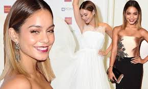 Vanessa Hudgens gleams in a strapless gown with thigh-high split before  changing into ethereal white dress to perform at the Voices On Point Gala