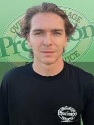 What does it mean to be a Precision Garage Door Professionally Trained  Employee?