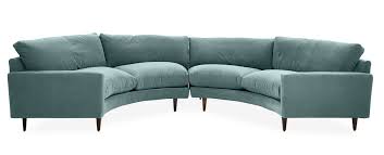 This curved sectional sofa is a bit smaller but just as versatile. Here S Why Your Home Needs A Curved Sofa Architectural Digest