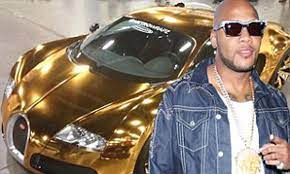 01 1937 bugatti type 57sc atlantic 4. Flo Rida S Gold Bugatti Rapper Spares No Expense As He Gives His 1 7m Car A Very Garish Makeover Daily Mail Online