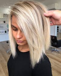 The blonde lob with dark roots and somewhat textured tips is a trendy and flattering option for long faces and fine hair. Stirring Hairstyles To Area Unit Undamaged In The Service Of Women Popular Their 50s Long Length Hairstyles For Thin Hair Over 50