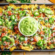 It S Tough To Beat The Combo Of Warm Tortilla Chips Melted Cheese And Spicy Black Beans In Other Word Bean Nachos Recipe Bean Nachos Black Bean Nacho Recipe