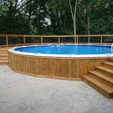 Many pool owners over the years have attempted to bury or partially bury an above ground pool in the ground. Pressure Treated Deck Picture 5244 Above Ground Pool Landscaping Above Ground Pool Decks Best Above Ground Pool