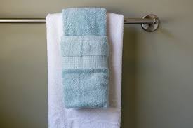 Thrift store bath decor towel hanger ~ who would have thought that a $.50 find could make such a gorgeous towel holder? How To Display Towels Decoratively Hunker Bathroom Towel Decor Hanging Bath Towels Decorative Bath Towels